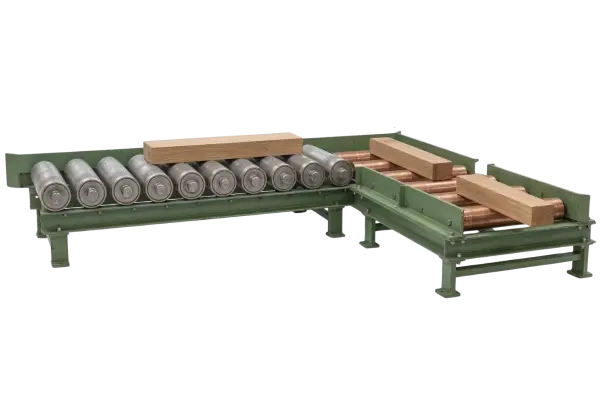 Processed lumber moving along a conveyor