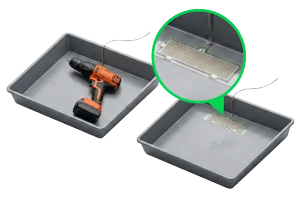 KS100 adhered to the base of a tool tray